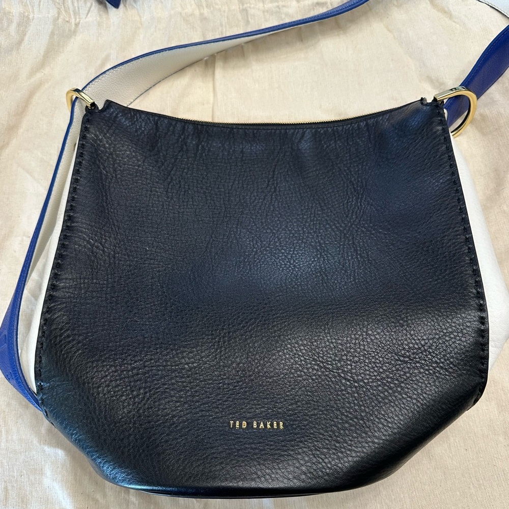 Ted Baker Black soft Leather Shoulder Bag 
Can be carried two different ways.